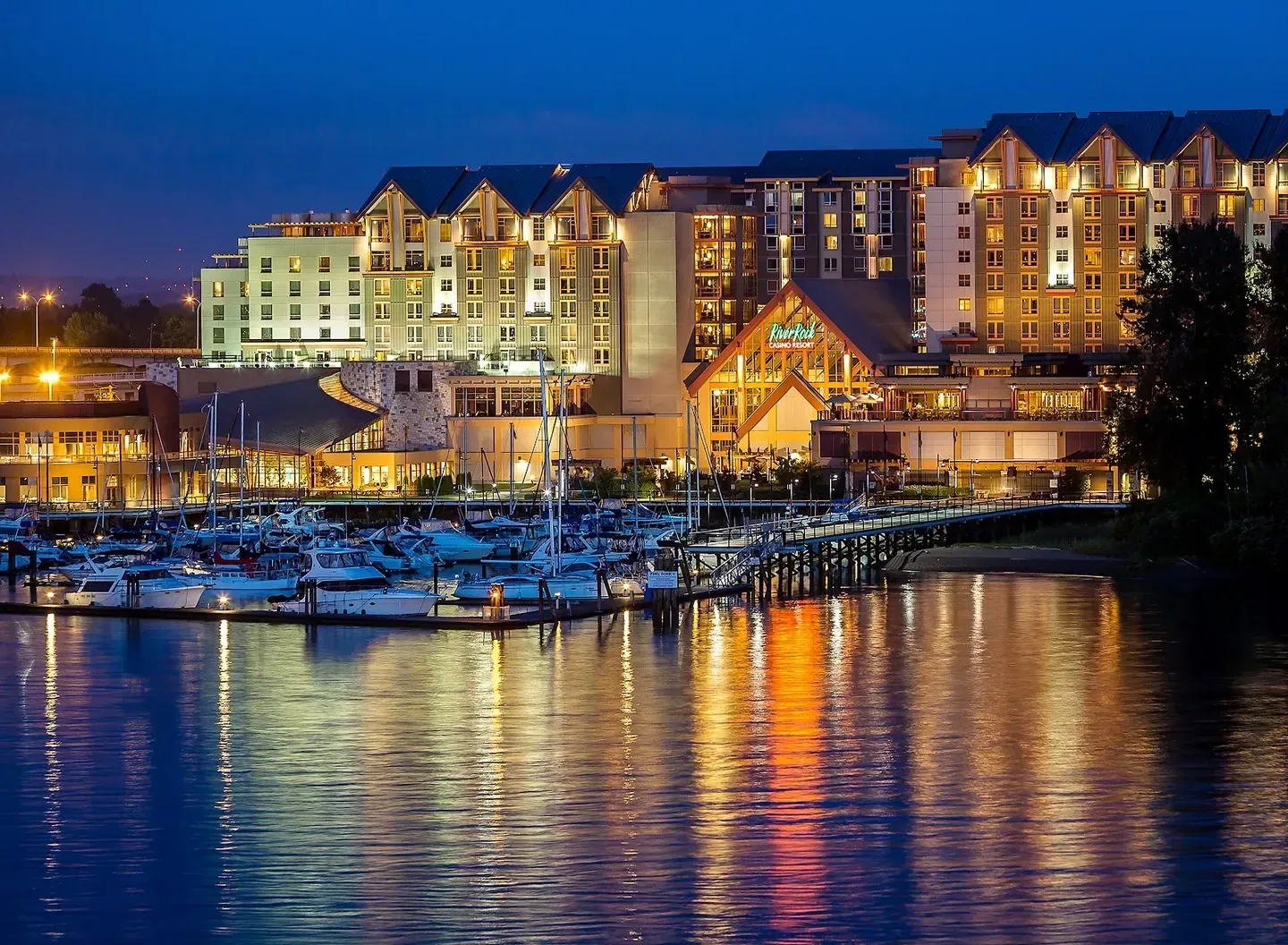 Waterfront resort exterior at dusk